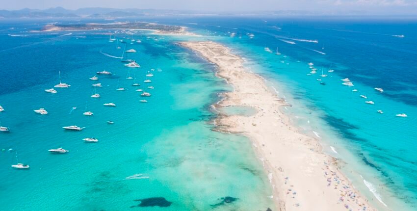 Formentera aerial view of turquoise water and yachts anchored
